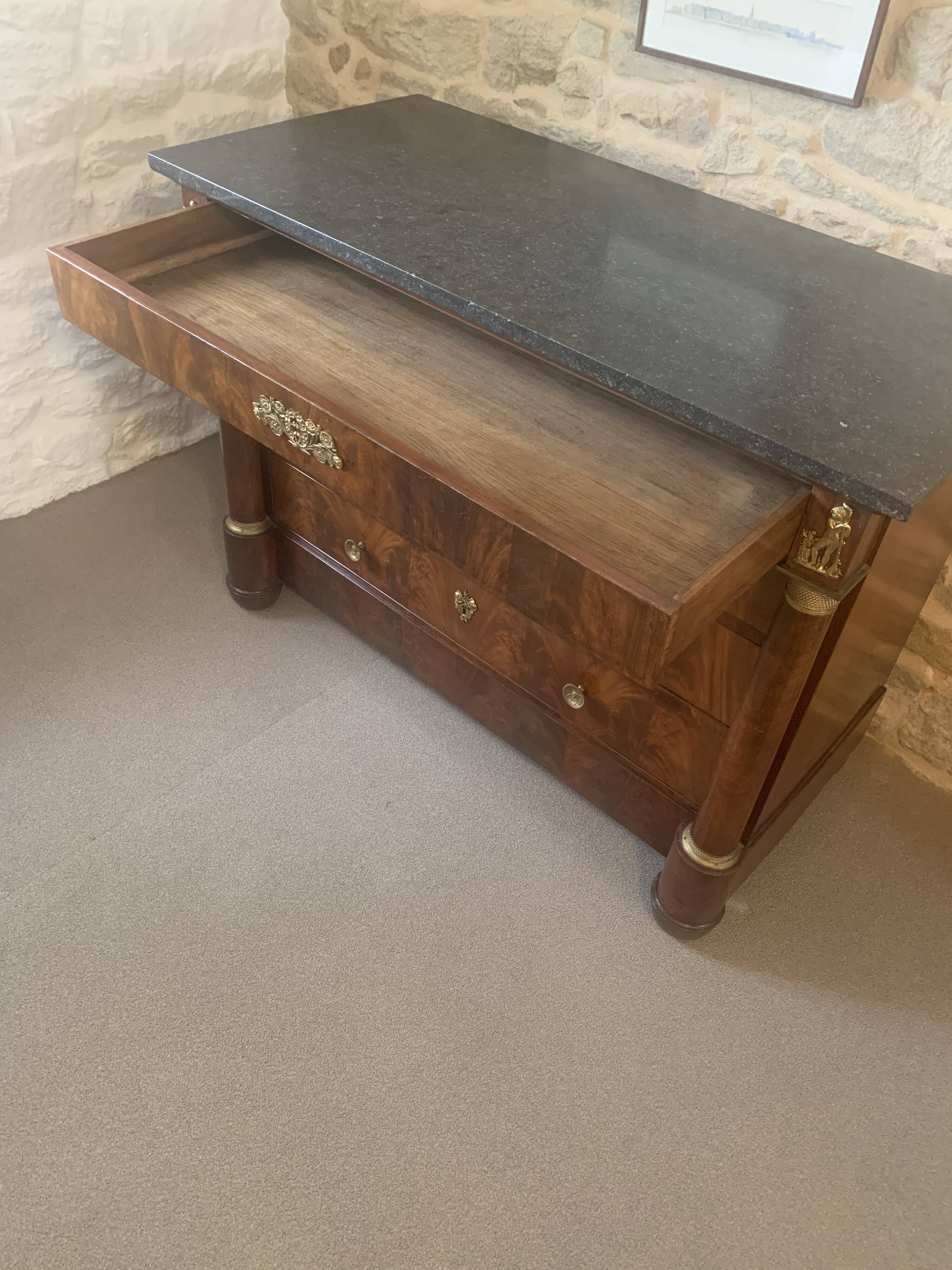 Empire chest of drawers with columns, 19th century mahogany