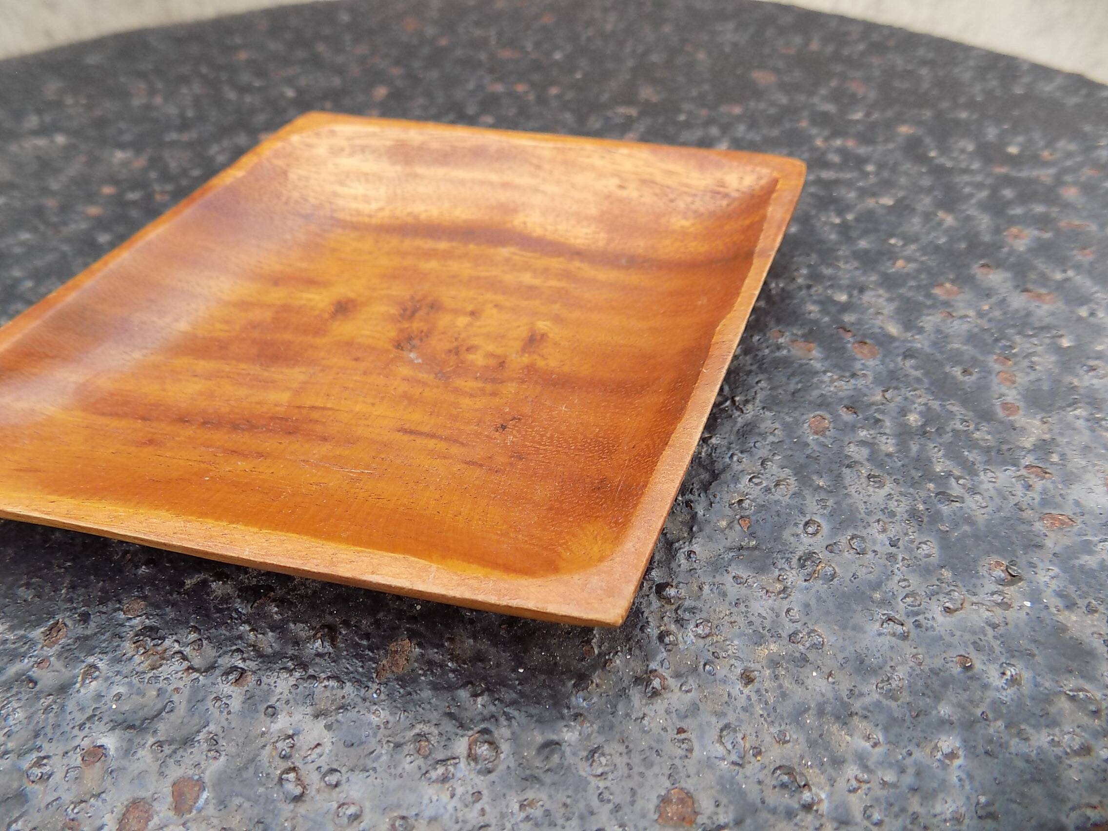 wooden pocket emptier