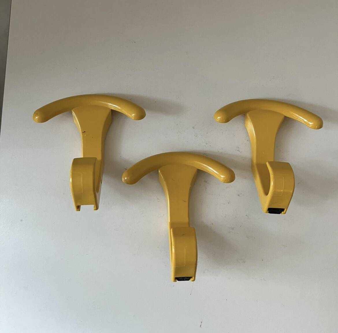Vintage yellow blue plastic wall coat hooks Memphis 1980s