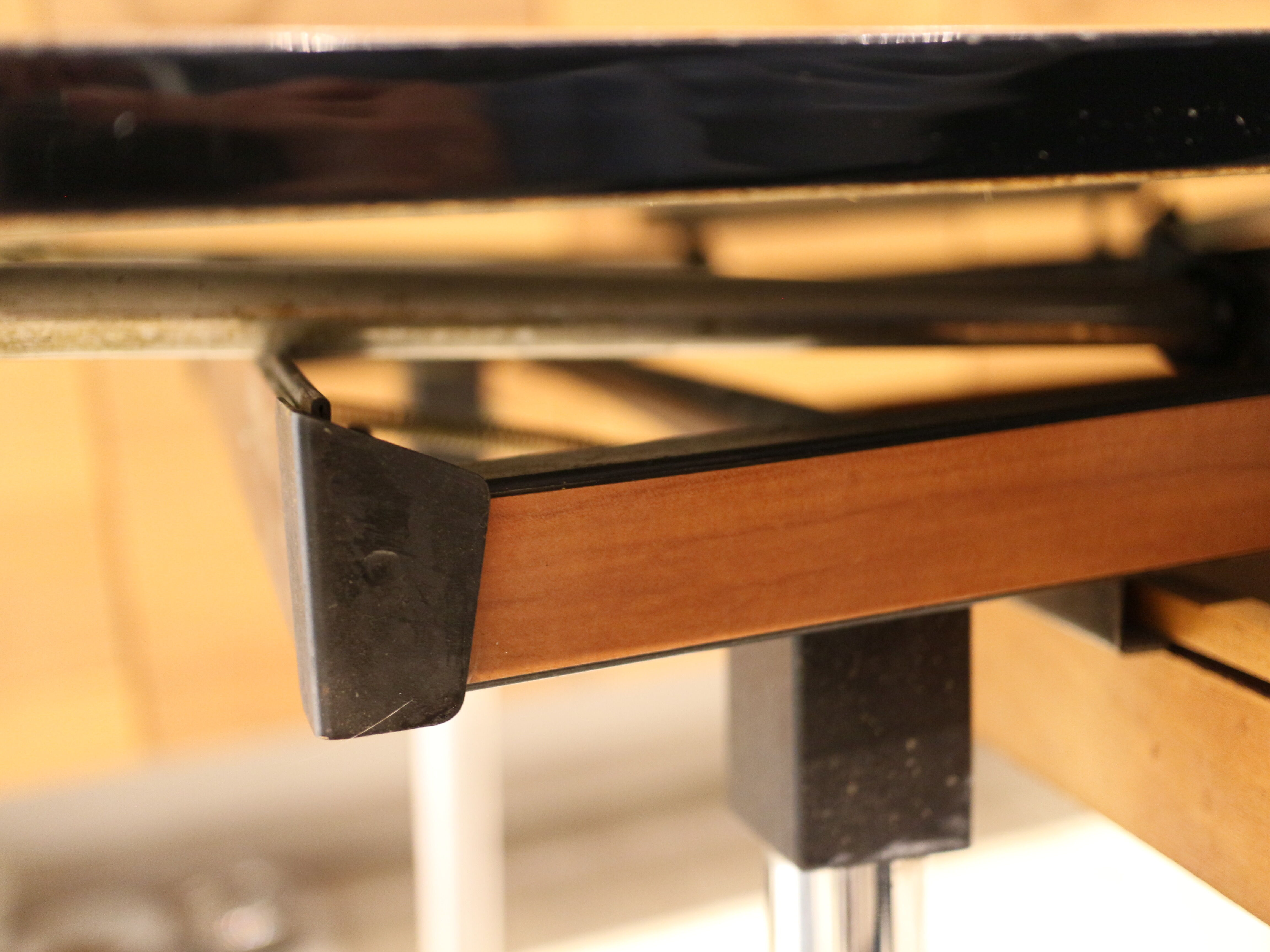 Briwn Formica table with extension cords and drawer