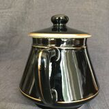 Black and gold ceramic coffee maker