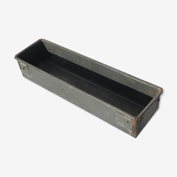 Empty metal mold pockets Indian rectangle pot containing India