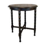 Vintage gueridon with beaded wooden legs.