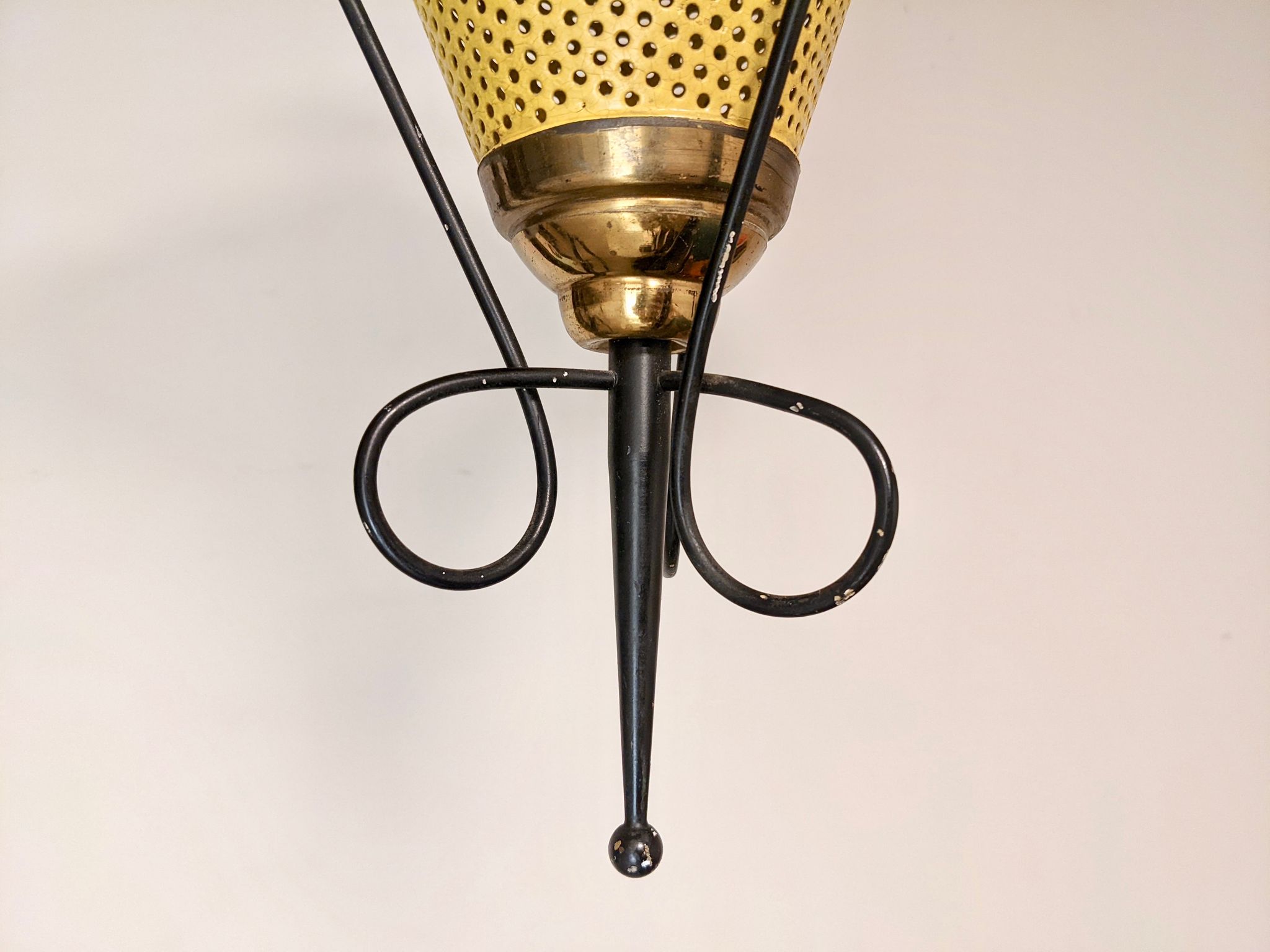 Suspension in perforated sheet metal