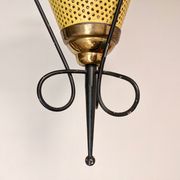 Suspension in perforated sheet metal