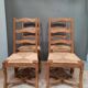 Serie de 4 chaises "os de mouton" à assises paillees