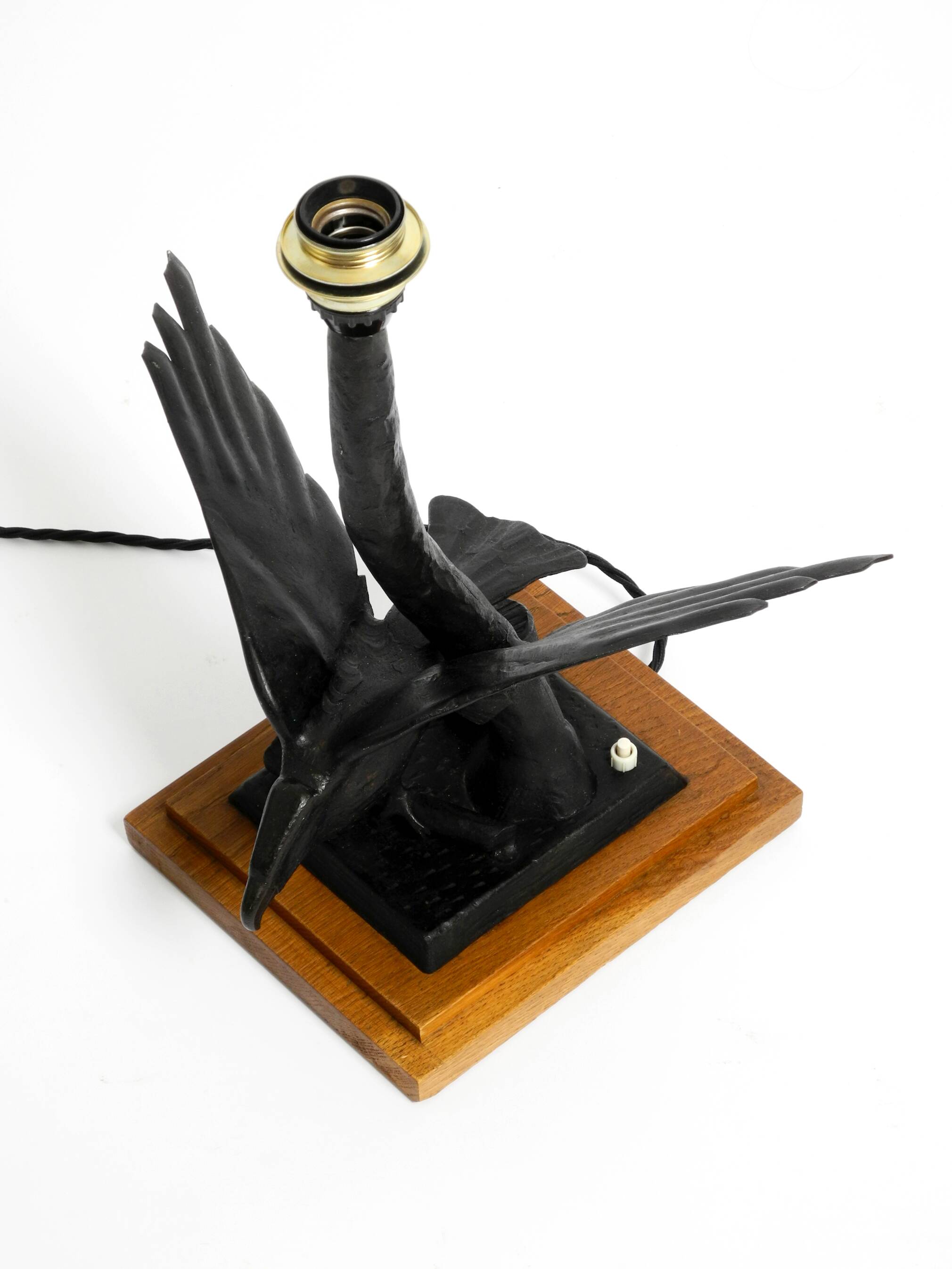 1940s table lamp made of iron in the shape of an eagle, teak wooden base