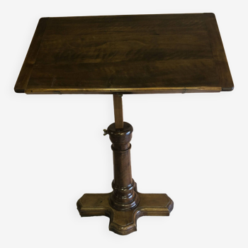 Adjustable writing table