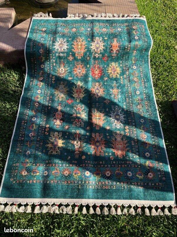 Modern rug with traditional Eastern patterns available for delivery only.