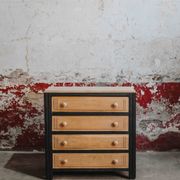 Black and natural wood chest of drawers with 4 drawers