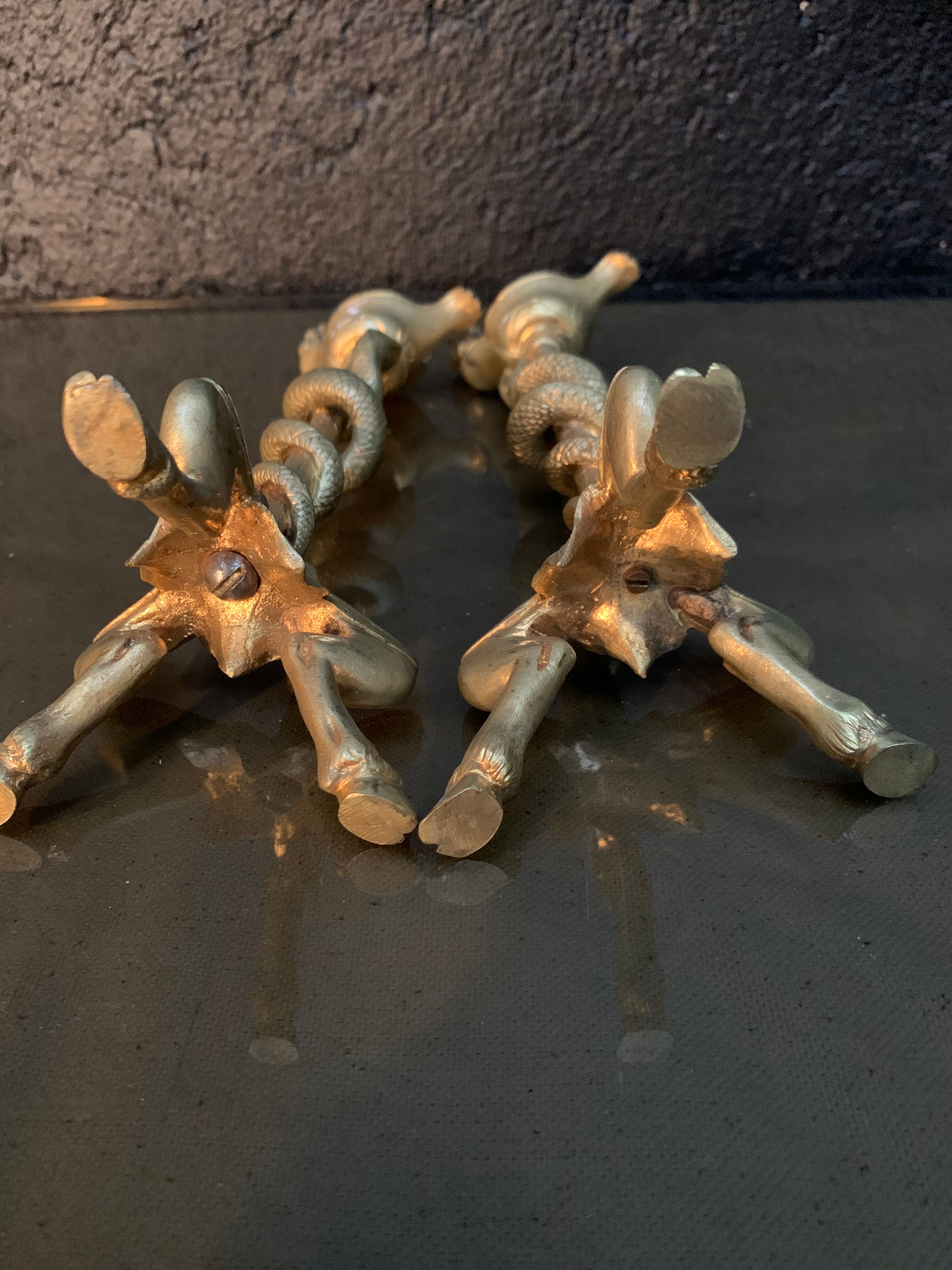 Pair of candlesticks with snakes, gilded bronze 19th century