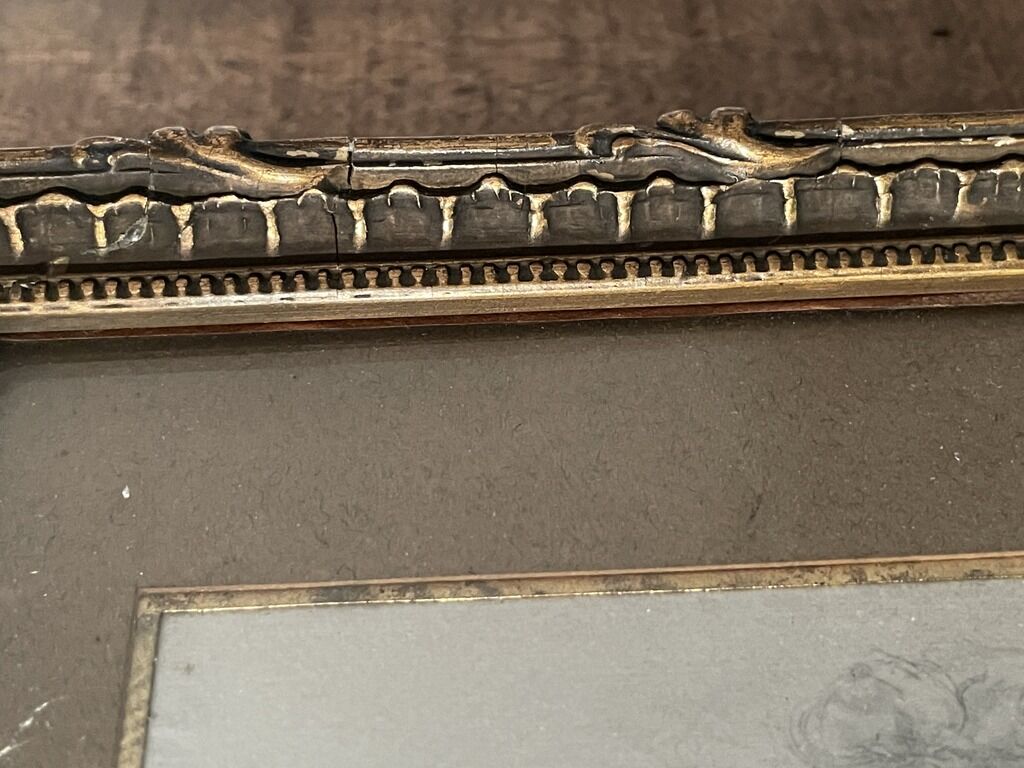 Old wood frame with a gold finish