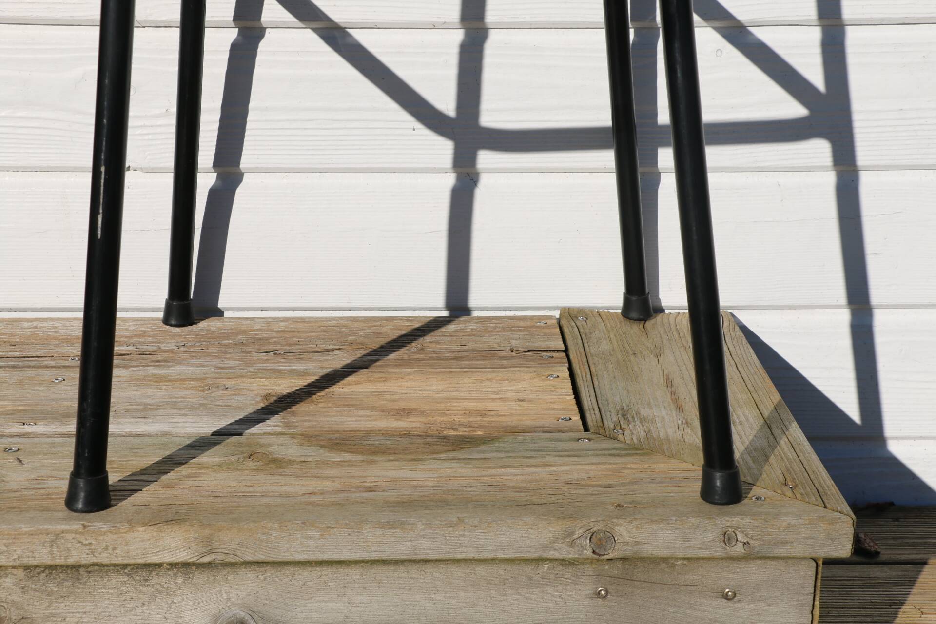 3 rattan and black metal stools dirk van sliedregt