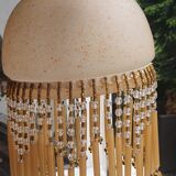 Chandelier in glass paste and tassels