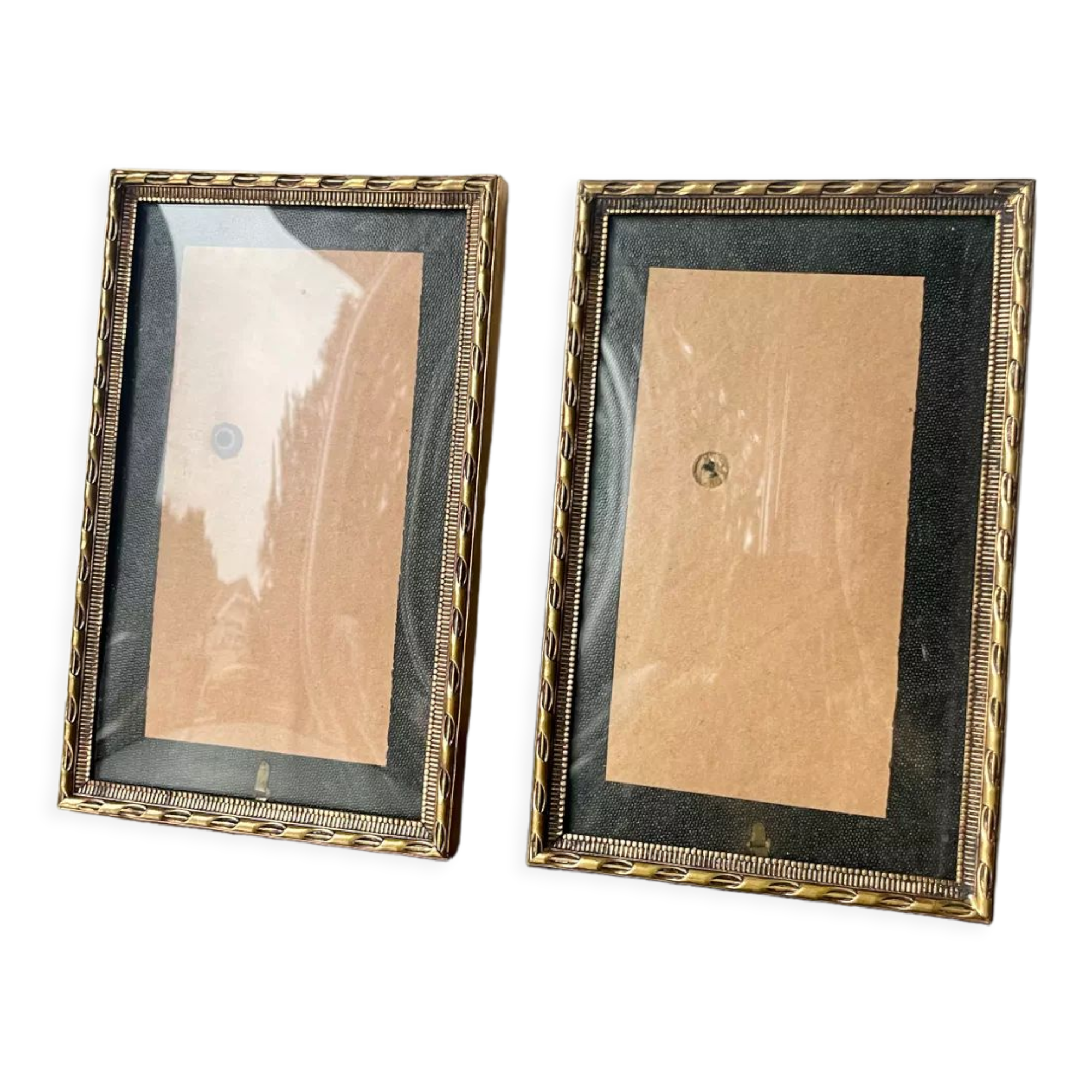 Pair of identical gold colored metal frames each measures  14.5 cm x 9 cm convex glass