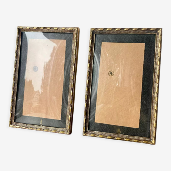 Pair of identical gold colored metal frames each measures  14.5 cm x 9 cm convex glass