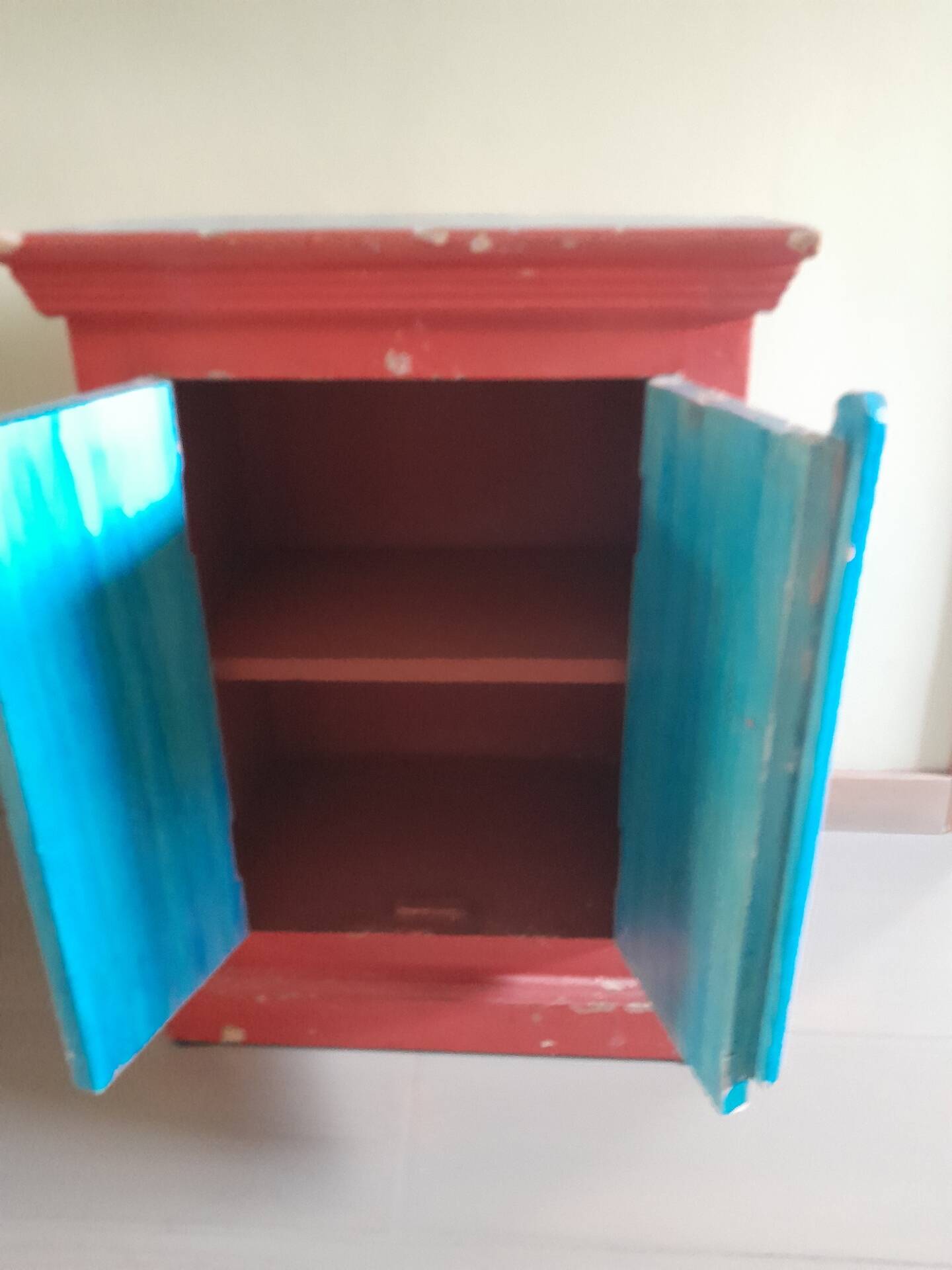 Painted wooden piece of furniture
