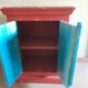 Painted wooden piece of furniture