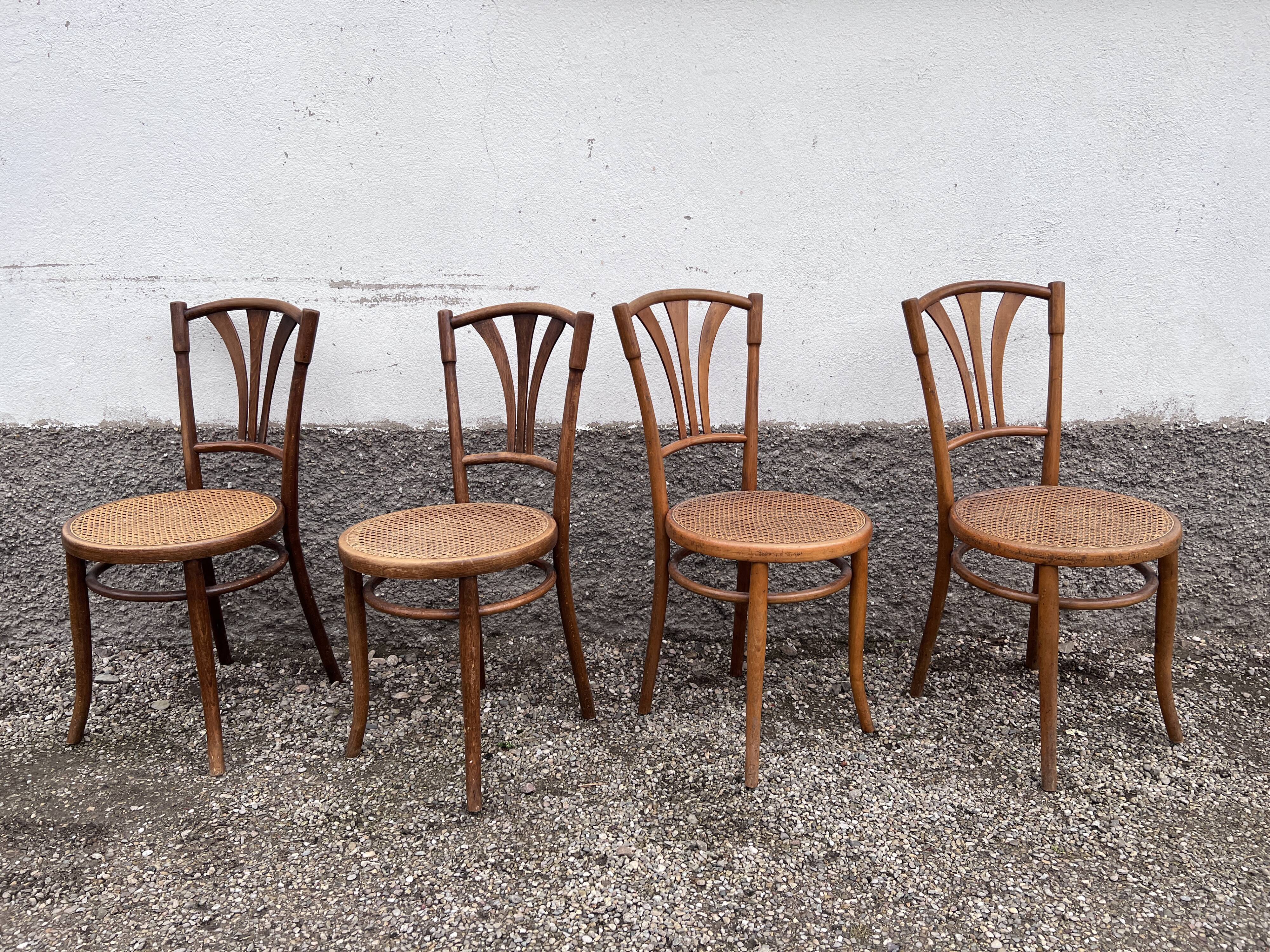 Series of 4 wooden chairs and cannage