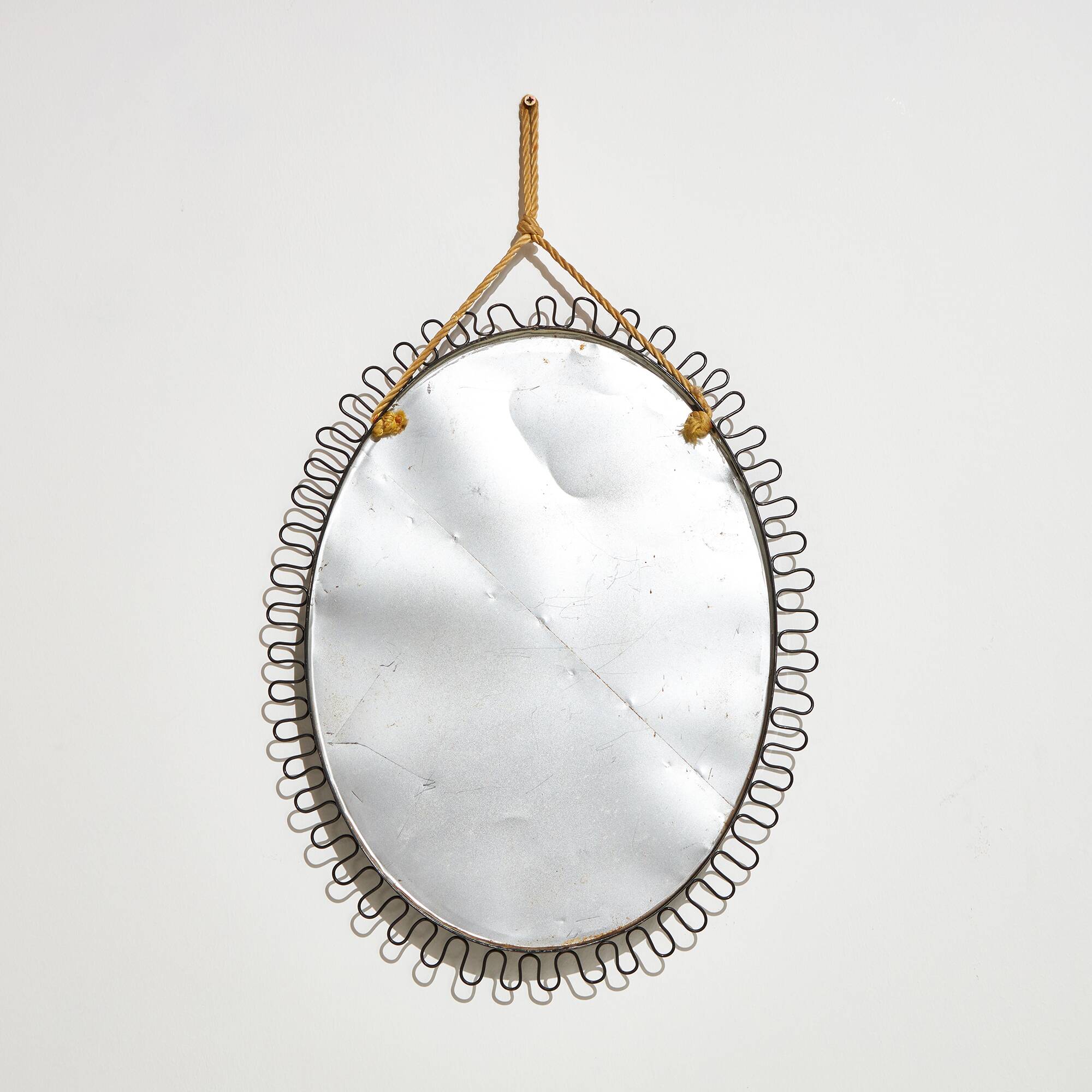 Miroir à cadre métallique