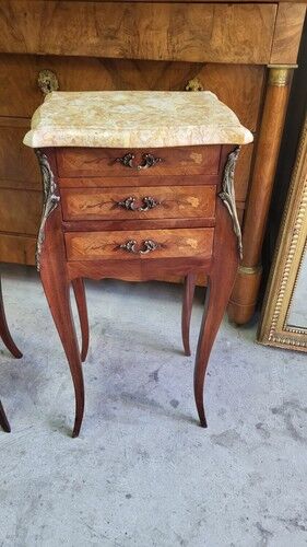 Pair of rosewood bedside tables with marble top