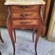 Pair of rosewood bedside tables with marble top