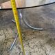 Table with chrome metal legs and smoked glass top.