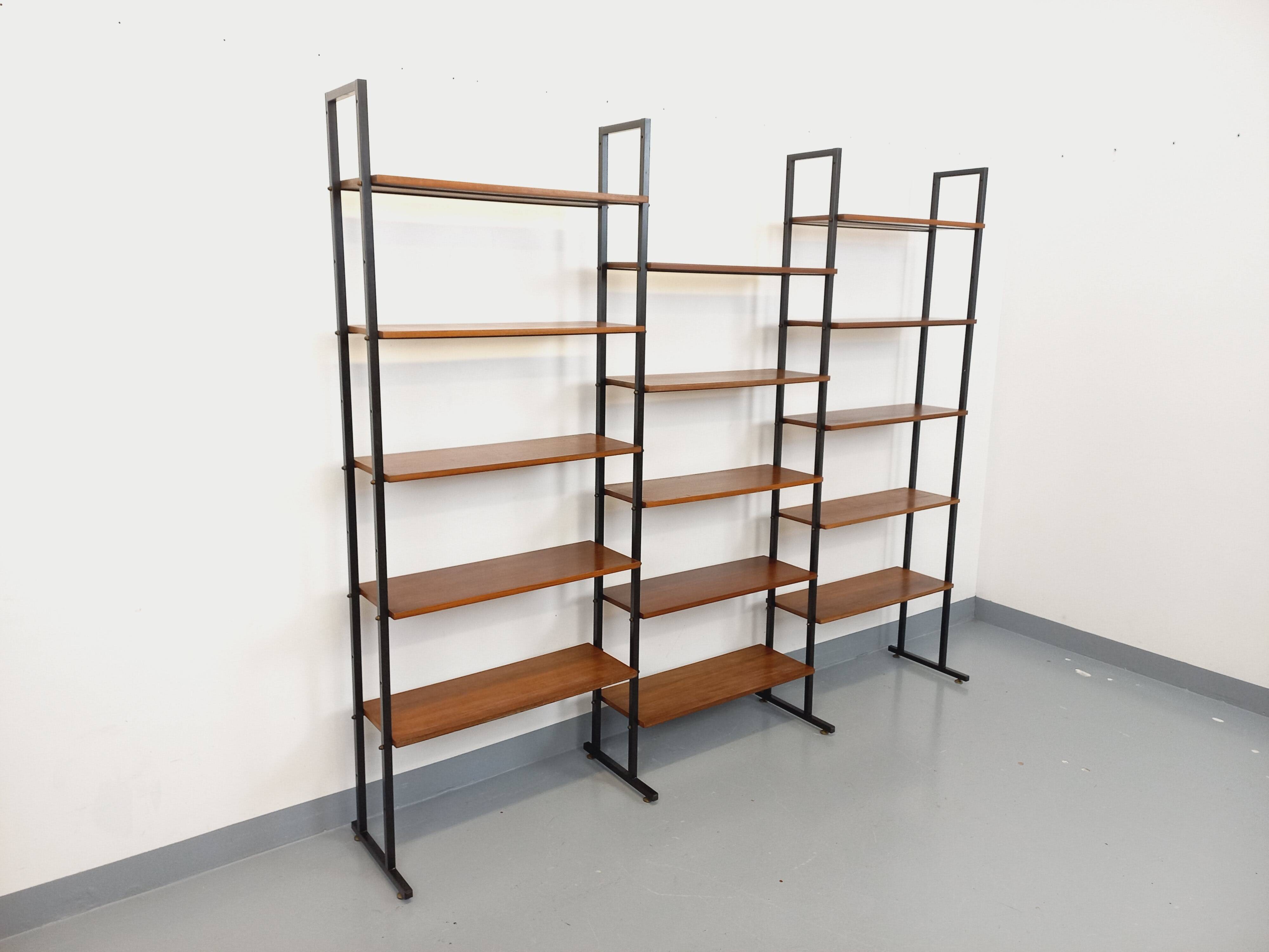 Vintage Italian triple modular bookshelf in teak and metal.