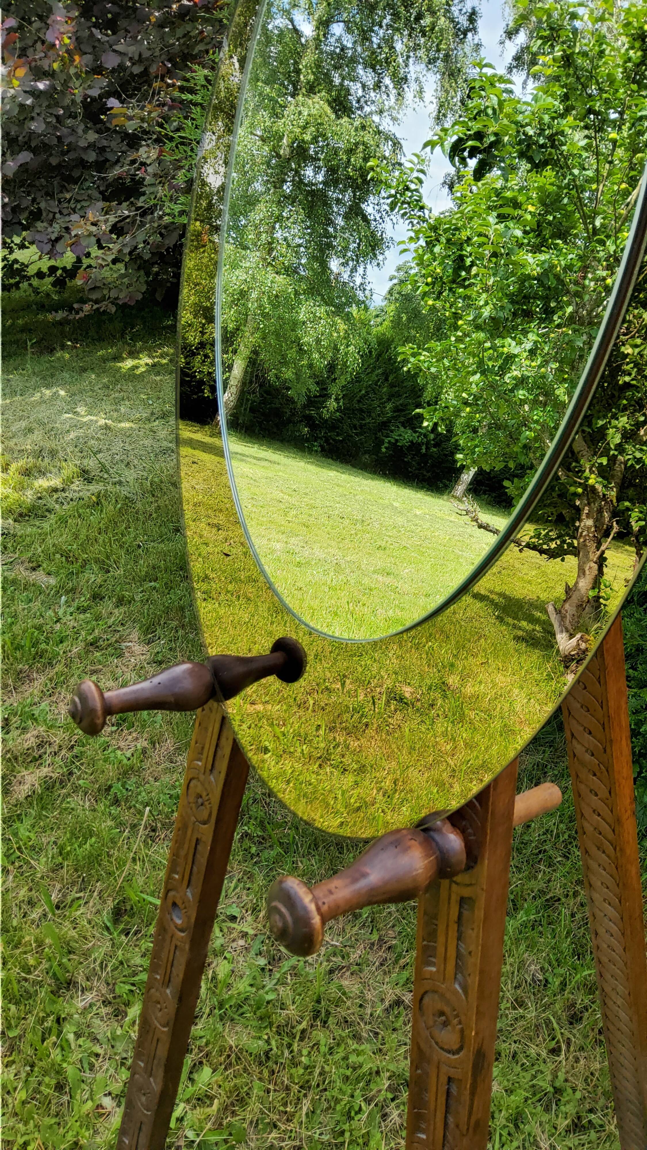 Oval Italian mirror of the 70s two complexions