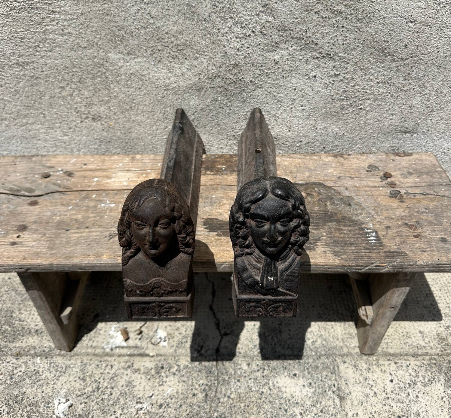 Pair of antique cast iron fireplace andirons, male and female couple