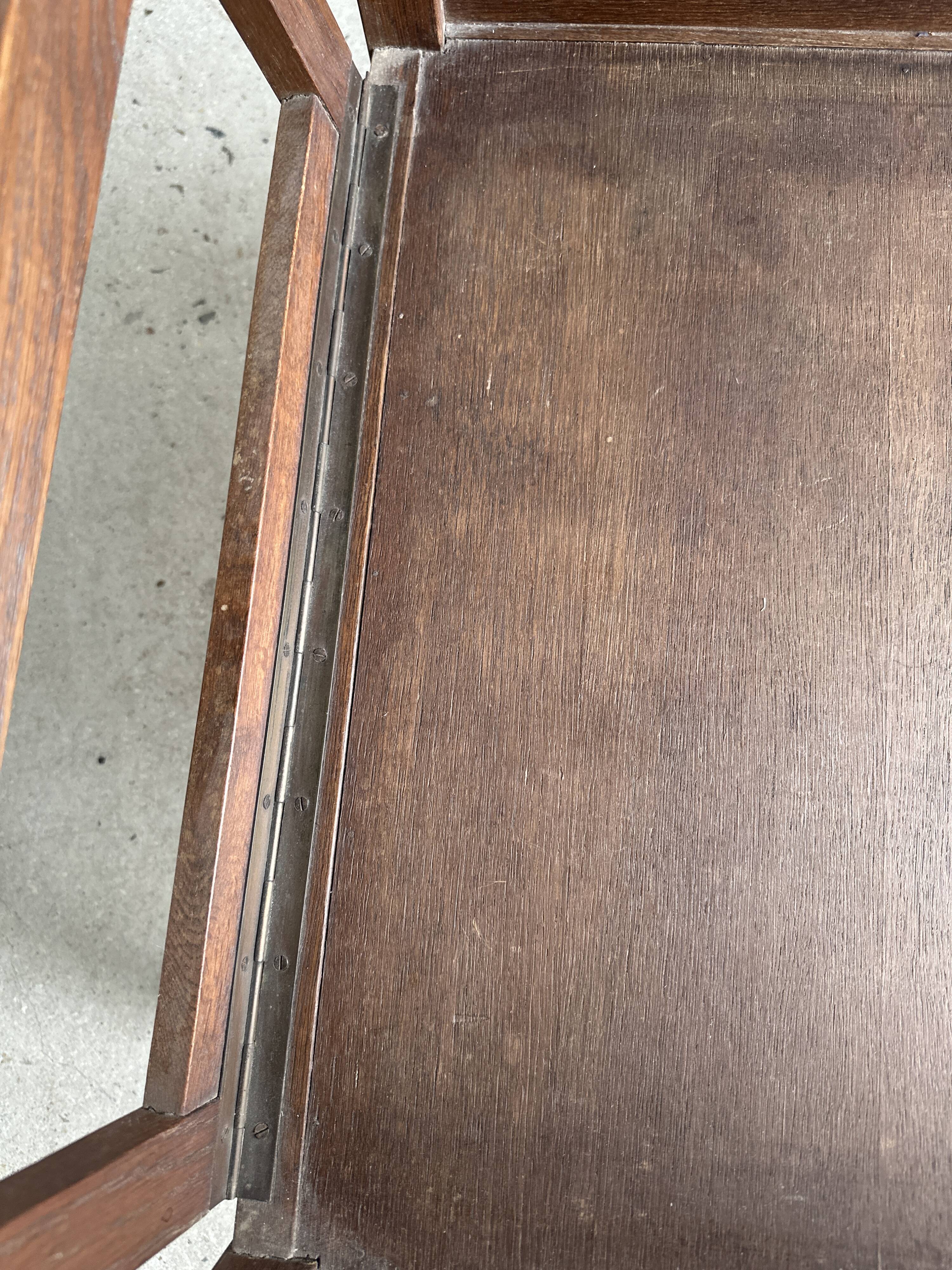 Large wooden armchair with adjustable reclining back