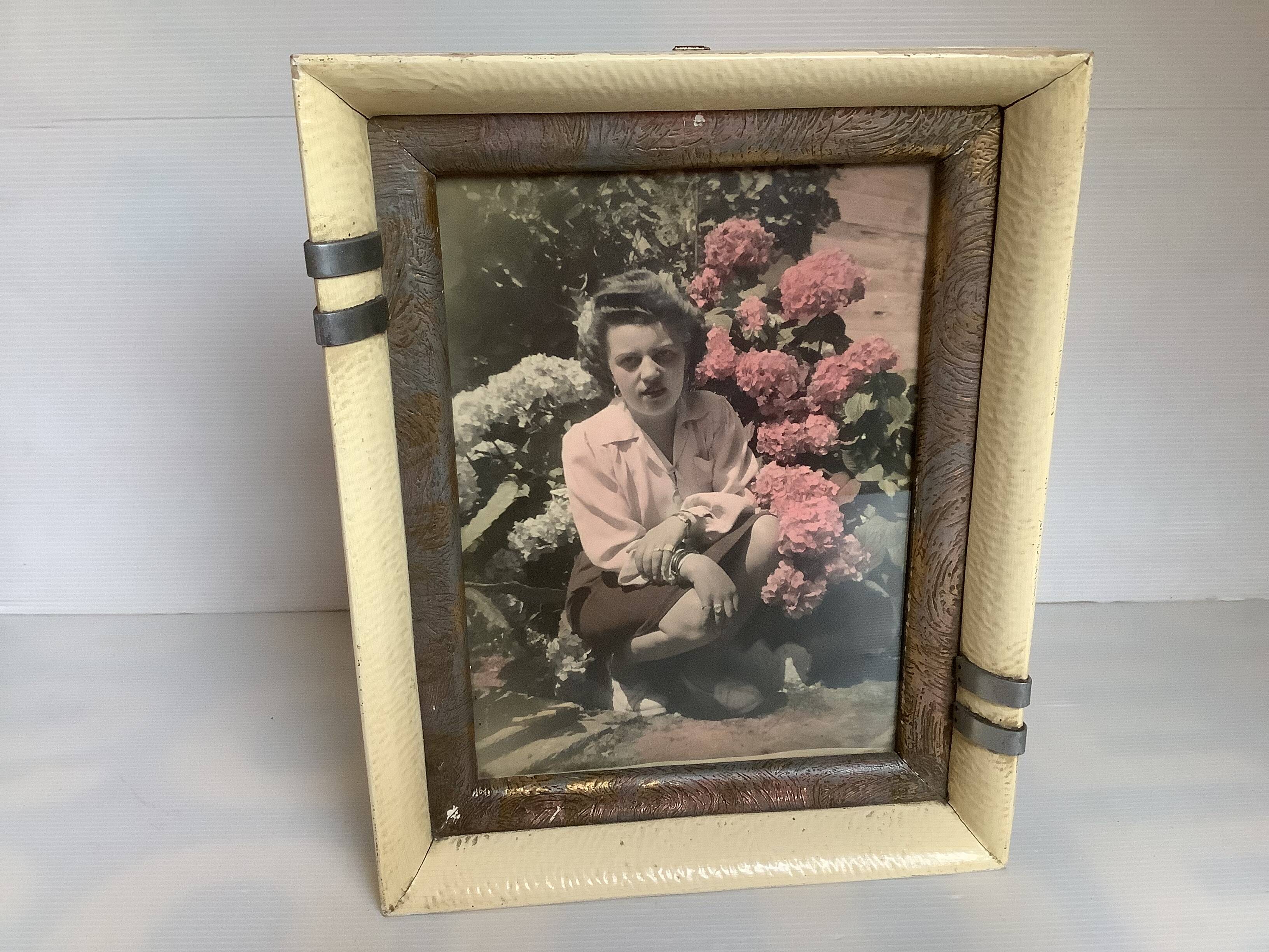 Old photograph of a woman with hydrangeas
