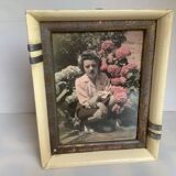 Old photograph of a woman with hydrangeas