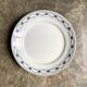 Round dish St Amand in enamelled iron earth white, blue and green