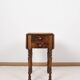 Small shuttered table, or side table.