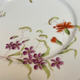 Set of 8 floral porcelain plates from the late 19th century.