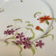 8 assiettes en porcelaine fleurie, fin XIXeme