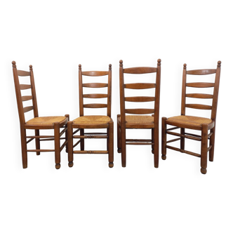 Set of 4 vintage brutalist Charles Dudouyt chairs in wood and straw from the 60s