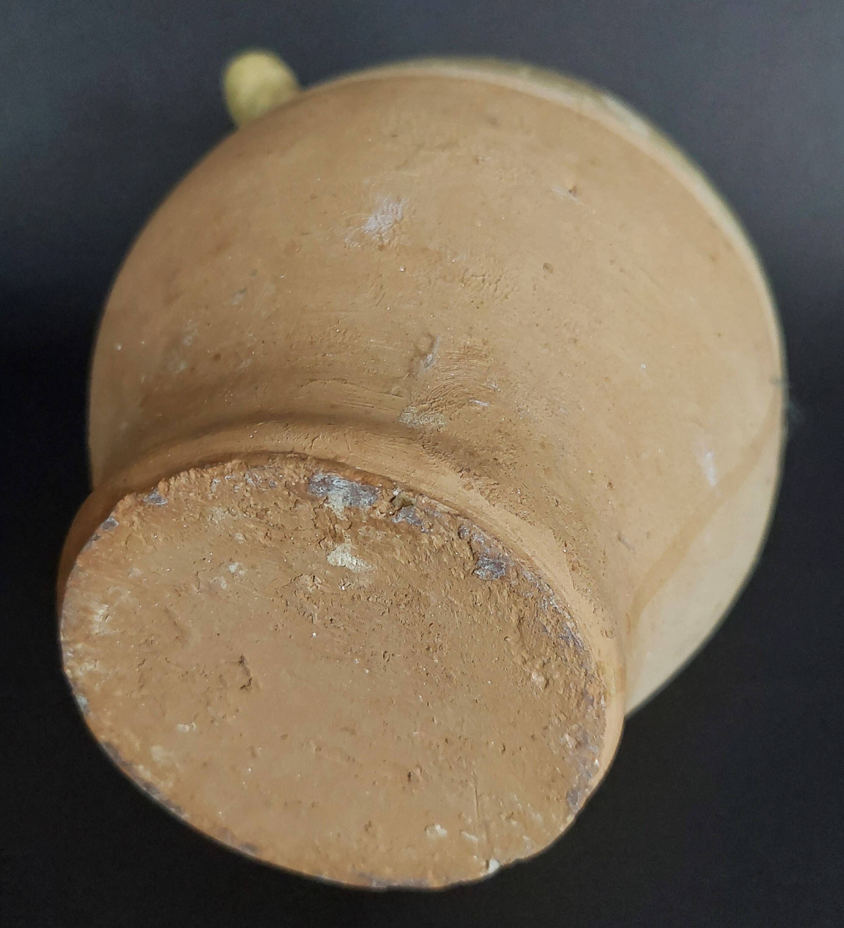 Cruche chevrette terre cuite vernissée à couverte jaune début XXème