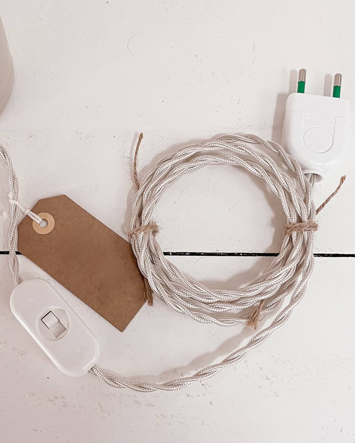 Sandstone lamp and striped lampshade