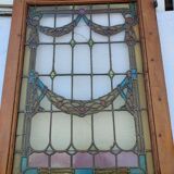porte en chêne avec des vitraux