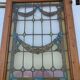 porte en chêne avec des vitraux