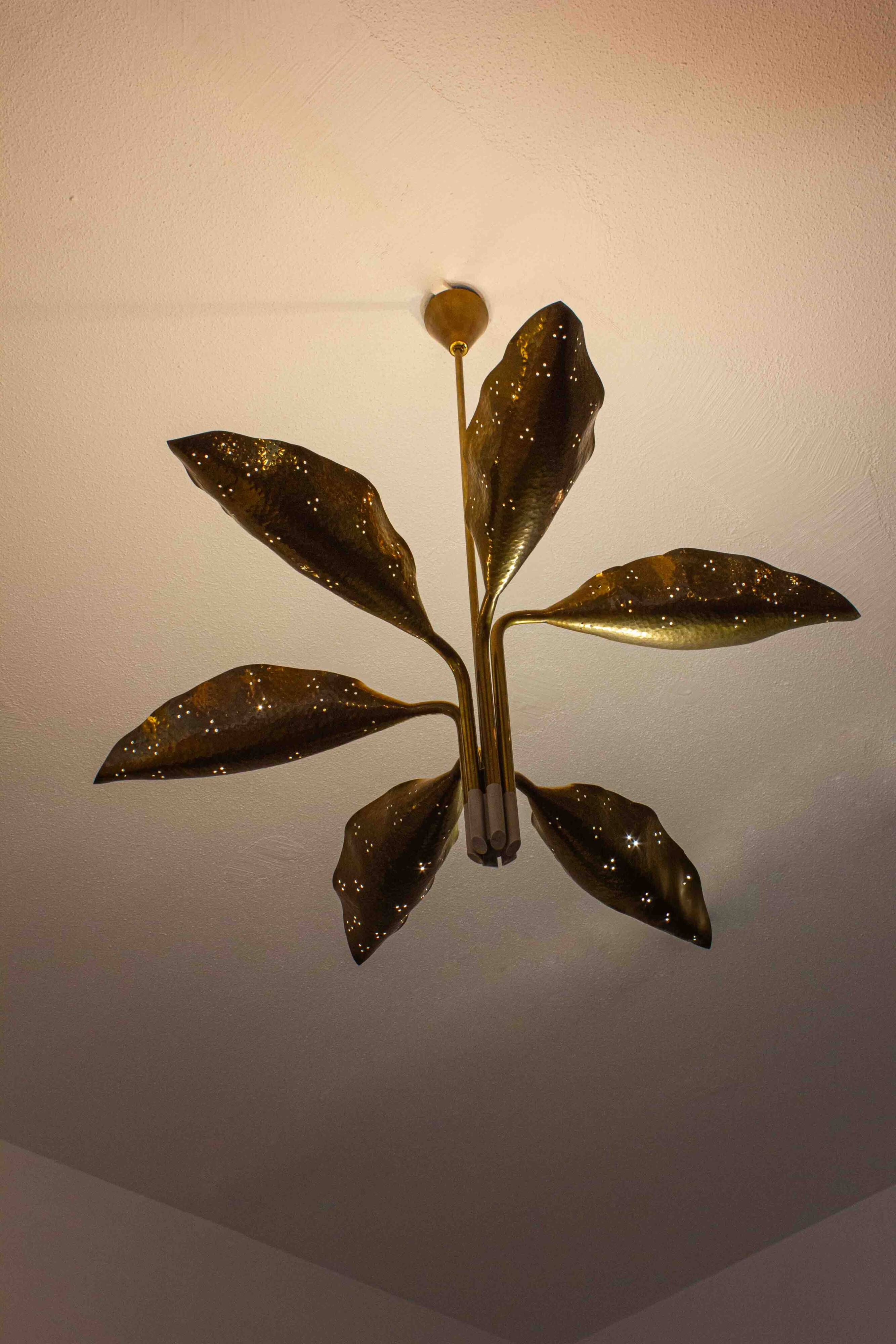 Incredible chandelier with perforated brass leafs by A.  Lelii, Italy 1950s