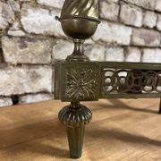 Pair of bronze andirons stamped bouhon frères in louis xvi style