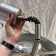 Brushed steel suspension