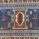 Tapis vintage en laine polychrome