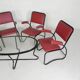 Set of 4 armchairs and a coffee table with tubular structure in Bauhaus style, 1950s.