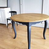 Antique extendable round table with Louis XV style extension