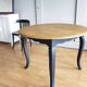 Antique extendable round table with Louis XV style extension