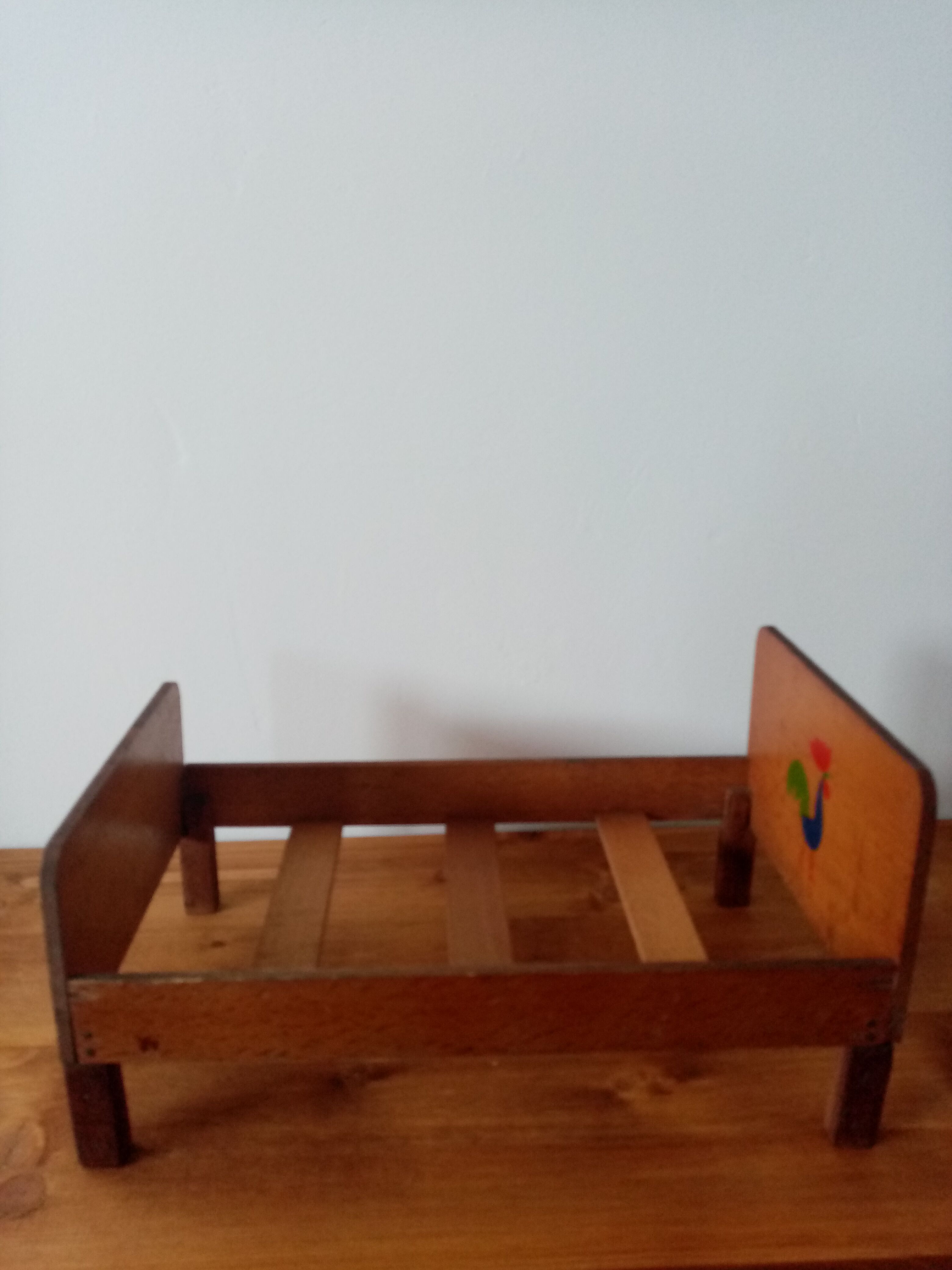 Wooden doll bed
